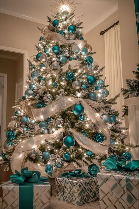 Looking for something vibrant? White and turquoise on a Christmas tree is refreshing and fun! Imagine pops of turquoise ornaments against a bright white base for a modern, oceanic vibe. Would this playful color scheme bring the perfect energy to your holiday decor? White Christmas Tree Color Schemes, Christmas Tree Color Schemes, Teal Christmas Tree, Turquoise Christmas Tree, Christmas Tree Colour Scheme, Glam Christmas Tree, The Perfect Christmas Tree, Perfect Christmas Tree, Christmas Tree Inspo