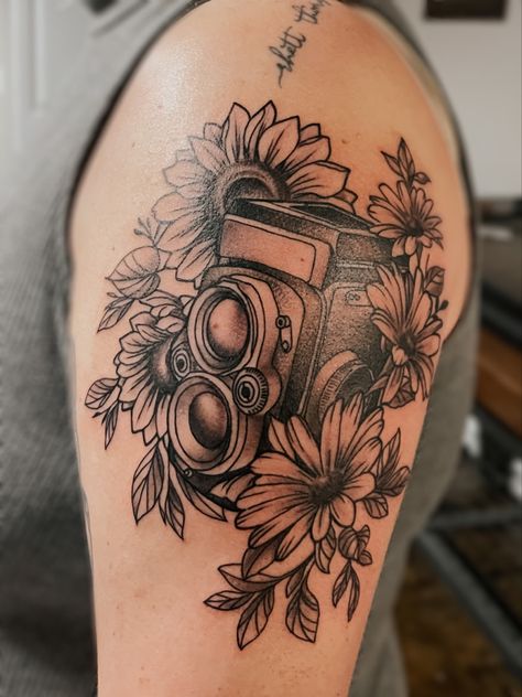 Half Sleeve camera tattoo Sunflowers and Aster Flowers Camera Floral Tattoo, Camera Tattoo Design, Flower Camera, Aster Flowers, Camera Tattoos, Camera Tattoo, Aster Flower, Lily Tattoo, Thigh Tattoo