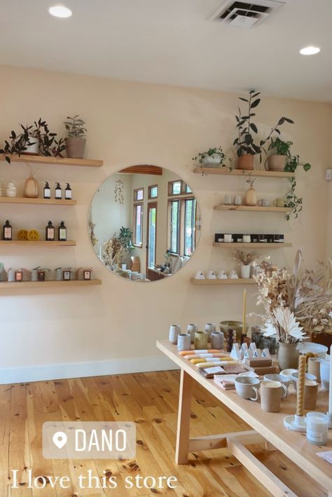 Spa Retail Products, Holistic Salon Ideas, Floating Product Shelves Salon, Massage Room Shelves, Esthetician Accent Wall, Skincare Studio Design, Earthy Esthetician Rooms, Boutique Spa Interior, Black And Tan Esthetician Room