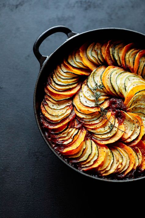 Ratatouille  Recipe courtesy of Tiffani Thiessen   Photography by Brandon Kidd Baked Zucchini And Squash, Vegetable Ratatouille, Zucchini And Squash, Homemade Hot Sauce, Slow Roasted Tomatoes, Ratatouille Recipe, Tiffani Thiessen, Baked Zucchini, Bake Zucchini