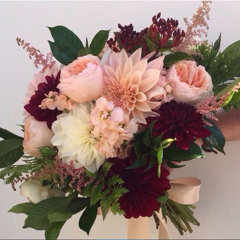 Pink And Maroon Flower Arrangements, White Blush Pink Burgundy Bouquet, Burgundy And Mauve Bouquet, Wedding Flowers Dahlia Burgundy, Rosewood Flower Bouquet, Pink And Burgundy Flower Arrangements, Burgundy Pink Flower Arrangement, Burgundy Pink Bouquet, Dahlia Bridal Bouquet Burgundy