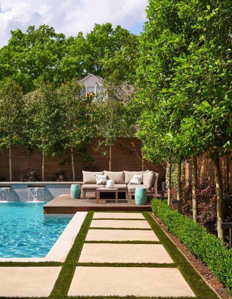 Texas home merges visual warmth with beautiful contemporary interiors Zellige Tile Pool Waterline, Pool Greenery, Pool Concrete, Privacy Landscaping Backyard, Grass Pavers, Pavers Backyard, Privacy Landscaping, Pool Landscape Design, Backyard Privacy