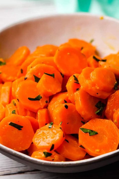 Buttery sautéed carrots are a quick and easy side dish that goes with so many things. With a hint of maple syrup (honey or brown sugar can be used instead) to enhance their natural sweetness, the rich taste of butter, and a squeeze of lemon juice to brighten it all up, this might become your new favorite way to make carrots. Boiled Carrots, Boil Carrots, Sauteed Carrots, Glazed Pork Chops, Sauteed Green Beans, Sauteed Zucchini, Roasted Chicken Breast, Cooked Carrots, Glazed Carrots