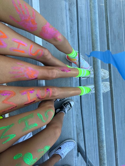 Neon Out Football Game, Neon Football Game, Spirit Face Paint, School Spirit Face Paint, Neon Football, Arm Painting, Leg Painting, Neon Painting, Hand Prints