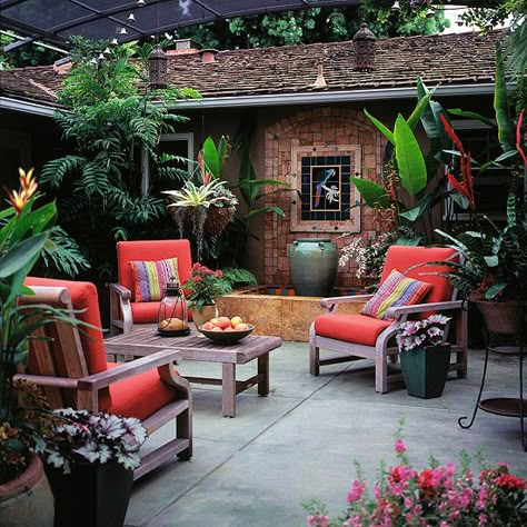 Create an outdoor escape by using tropical plants  to make it feel like a lush rain-forest. More patio perk-ups: http://www.bhg.com/home-improvement/patio/24-patio-perk-ups/?socsrc=bhgpin061513tropical=19 Tropical Patio, Have Inspiration, Outside Living, Patio Interior, Backyard Retreat, Porch Patio, Outdoor Oasis, Backyard Oasis, Outdoor Rooms