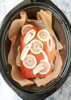 How to Cook Salmon in a Crock Pot -- Ensures tender, succulent salmon every time. Cook a few fillets, or a whole bunch (and you can freeze the leftovers!) Cook Salmon, Healthy Slow Cooker, Slow Cooker Recipes Healthy, Cooking Salmon, Crock Pot Slow Cooker, Healthy Crockpot, Crockpot Meals, Crock Pot Cooking, Healthy Crockpot Recipes