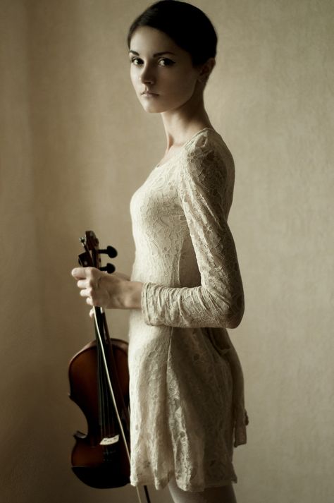 . Right Hand, Violin, A Woman, White