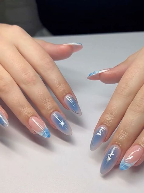 Blue Aura Chrome Nails, Nails To Go With A Light Blue Dress, Light Blue Prom Nails Almond, Dreamy Blue Nails, Aura Nails Stars, Blue Design Almond Nails, White And Blue Aura Nails, Blue Shine Nails, White And Blue Almond Nails