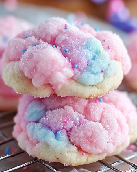 Cotton Candy Cookies 🍬🍪 These soft, colorful Cotton Candy Cookies bring the whimsical flavors of your favorite fair treat to life in a fun and chewy cookie form! Ingredients: - 1 cup unsalted butter, softened - 1 1/4 cups granulated sugar - 2 large eggs - 2 teaspoons vanilla extract - 2 1/2 cups all-purpose flour - 1/2 teaspoon baking soda - 1/2 teaspoon baking powder - 1/4 teaspoon salt - Cotton candy flavoring, a few drops (optional) - Pink and blue food coloring - Sprinkles for decoratio... Cotton Candy Cookies Recipes, Pink And Blue Food, Cotton Candy Dessert, Candy Cookies Recipes, Cotton Candy Cookies, Cotton Candy Flavoring, Blue Food Coloring, Blue Food, Candy Cookies