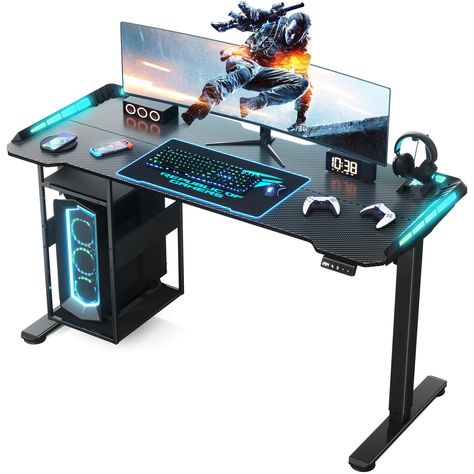 PRICES MAY VARY. UNIQUE STORAGE DESIGN: The gaming desk has an underdesk management design, transferring complex data lines to the table, releasing valuable desktop space and bringing you a better game experience. The underdesk system includes a management tray for plugs, routers, etc.; a magnetic cable slot fixes line direction for easy storage and makes everything clear. Equipped with an enclosed host shelf that allows the host to follow the table when adjusting the height. IMMERSIVE GAMING EX Desk For Gaming, Desk With Led Lights, Pc Gaming Desk, Gamer Desk, Management Design, Desk Black, Electric Standing Desk, Gaming Table, Pc Desk