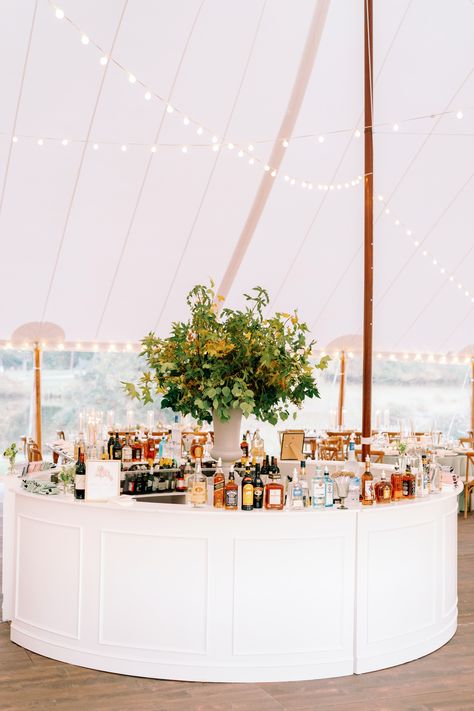 Make a statement with our 12' Round Bar. Photography: @katiestoops Videography: @bowenfilms Florals: @sophiefelts Rentals/tent/lighting/flooring: @honeywoodrentals Linens: @selecteventgroup Catering: @zeffertandgold H&MU: @jasminepalmaartistry Cake: @michellescakes Entertainment: @bachelorboysband Invitations: @raiseyourwordsdesign Save the Dates: @mintedweddings Signs: @thedandelionpatch Round Bar Wedding Receptions, Tent Cocktail Hour, Wedding Tent Bar, Tented Wedding Reception Layout, October Tent Wedding, Circular Bar Wedding, Round Wedding Bar, Circle Bar Wedding, Round Bar Wedding