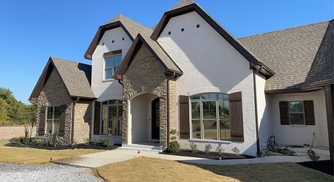 Stone Concepts & Brick on Instagram: "This house built by Tyer Construction is a dream! They used General Shale Winterhaven and we have it in stock now!!! Come in today to talk to a sales rep! #generalshalebrick #white #winterhavenbrick #newbuild #beautifulhome #tyerconstruction" Tan Stone House Exterior, Stone House Cream Windows, Brick House With Stone Foundation, Tyndall Stone Exterior House, Brown Stone House Exterior New York, House Built, Brick And Stone, Brick House, New Builds