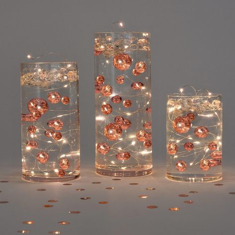 Amazon.com: Floating Metallic Rose Gold Pearls - Including Water Gels & Kit for The Floating Effect - Centerpiece Decorations : Home & Kitchen Floating Centerpieces, Pearl Centerpiece, Floating Candle Centerpieces, Lighted Centerpieces, Rose Gold Pearl, Metallic Rose Gold, Ideas For Easter Decorations, Gold Vases, Ideas For Easter