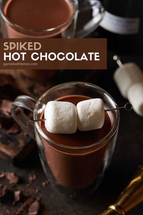 There's no better way to warm up on a chilly night than a mug of this decadent Spiked Hot Chocolate. Smooth, creamy and not too sweet, this hot chocolate with alcohol is better than any powdered cocoa mix and just as easy to make with only six ingredients! Hot Chocolate With Alcohol, Chocolate With Alcohol, Chocolate Alcoholic Drinks, Alcoholic Hot Chocolate, Spiked Hot Chocolate Recipe, Spiked Hot Cocoa, Alcohol Chocolate, Batch Cocktail Recipe, Spiked Hot Chocolate