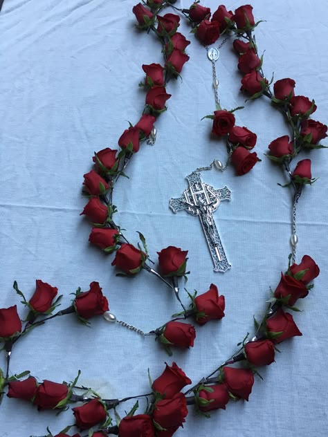 Red rose rosary Rosary Made Of Roses, Making Rosary Beads From Roses, Red Rosary Tattoo, Rosary Decor, Rosary Wallpaper, Rosary Tattoo Wrist, Rosary Aesthetic, Rosary Art, Rose Rosary