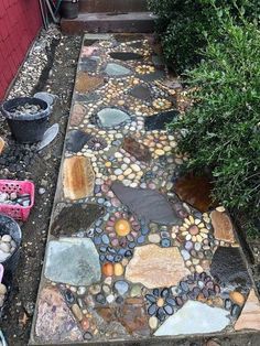 The Mission: Replacing an ugly concrete pathway with a unique and intricate stone mosaic pathway. #diyhomedecor #mosaic #pathway Cement Rocks Diy Pathway, Diy Walking Path, Mosaic Pathway, Diy Mosaic Garden, Front Garden Path, Mosaic Walkway, Concrete Pathway, Pebble Garden, Concrete Stepping Stones