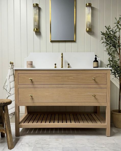 This morning we are showing the beautiful Italian 2 drawer oak vanity unit we designed before we deliver out to our customer ❤ The Smoke Stain by @rubiomonocoatuk harmonises flawlessly with the allure of the golden-framed mirror from @origins_living. Casting a warm glow, the wall lights by @pookylights, adorned with golden accents, illuminate the space with elegance. Complementing this aesthetic, the golden towel hooks and handles from @corstonarchitecturaldetail add a touch of refinement to... Silestone Worktop, Oak Vanity Unit, Oak Vanity, Drawer Vanity, Wall Mounted Taps, Paint And Paper Library, Basin Unit, Wooden Chopping Boards, Countertop Basin