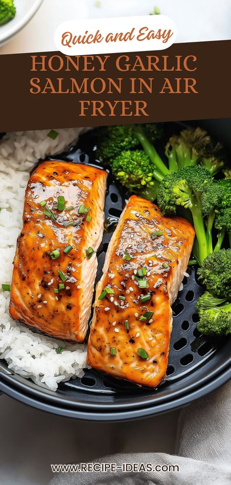 Trying to make a quick and delicious dinner? This Honey Garlic Salmon recipe, made effortlessly in your air fryer, is your answer. The salmon turns out perfectly tender and infused with a rich sweet and tangy sauce. Air frying with honey and garlic creates a delightful crust while keeping the fish juicy inside. Pair it with steamed veggies or rice for a complete meal. Perfect for busy weekdays or a relaxed dinner with friends. Healthy, flavorful, and quick! Try it today for an instant standout dish. Airfryer Recipes Salmon, Whole 30 Salmon Recipes Air Fryer, Air Fryer Salmon Soy Sauce, Air Fryer Salmon Healthy, Air Fryer Salmon And Veggies, Asian Air Fryer Salmon, Salmon Filets In Air Fryer, Airfry Salmon Recipes, Salmon In Air Fryer Recipe