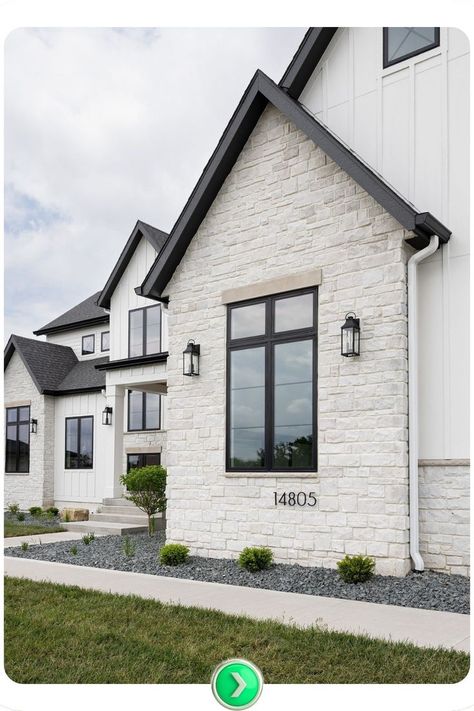 Sleek black window trim against a white facade offers a minimalist yet striking look. Ideal for modern exteriors, it adds depth and sharpness without overwhelming the design. Window Trim Design, Black Window Trim, Exterior Window Trim, White Stucco House, White Home Exterior, Stone Siding Exterior, White Facade, Modern Exteriors, White Farmhouse Exterior