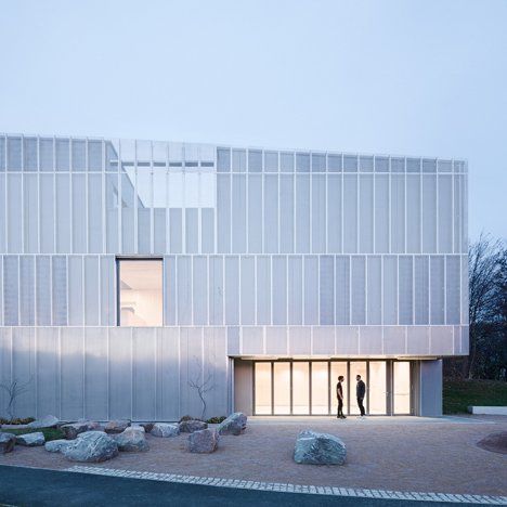 The perforated metal facade of this building in Sheffield, England, was designed by Architecture 00 to eventually become a framework for climbing plants Screen Facade, Innovation District, Concrete Retaining Walls, Aluminium Cladding, Metal Facade, Green Facade, Double Skin, Metal Cladding, Facade Lighting