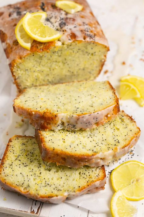 My Lemon Poppyseed Cake has a moist, tender crumb, is studded with plenty of poppyseeds and full of natural lemony citrus flavors. The cake is infused with a lemon simple syrup to keep it ultra-moist and is finished with a simple lemon icing. #lemoncake #lemonpoppyseed #lemonpoppyseedcake #lemonpoppyseedbread #lemonloaf #springdesserts #summerdesserts #lemondesserts #krollskorner Lemon Poppy Loaf, Lemons Cake, Lemon Simple Syrup, Poppy Seed Cake Recipe, Poppyseed Cake, Syrup Cake, Lemon Poppyseed Bread, Lemon Poppyseed Cake, Bee Sweet