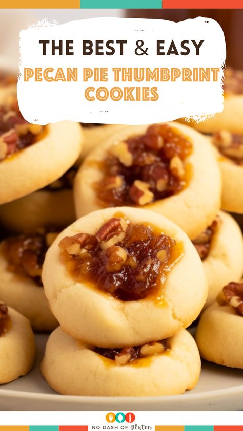 Discover the joy of baking with these Pecan Pie Thumbprint Cookies! A delightful combination of soft, buttery cookie dough and a luscious pecan pie filling, these cookies are sure to be a hit at any gathering. Perfect for holidays, family events, or just a cozy night in. Easy to make and irresistibly delicious, they bring the essence of pecan pie to your cookie jar. Don't miss out on this sweet adventure – grab the recipe now and start baking your new favorite treat! Pecan Pie Thumbprint Cookies Recipe, Homemade Thumbprint Cookies, Easy Thumbprint Cookies Simple, Pecan Pie Shortbread Cookies, Pecan Finger Cookies, Pecan Pie Thumbprint Cookies, Pecan Pie Cookies Easy, Cookie Press Cookies Recipe, Oatmeal Thumbprint Cookies