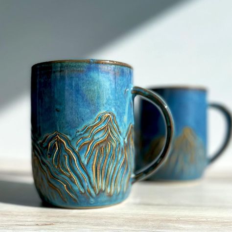 Mountain Mud Ceramics on Instagram: “Mountain mugs for mugshot Monday 🏔 ☀️ #mugshotmonday #mountainmug #potterymugs #ceramicmug #handmademugs #teamugs #coffeemugs #muglife…” Ceramic Mountain Mug, Mountain Mug Pottery, Mountain Mugs, Pottery Brand, Mountain Mug, Pottery Projects, Glaze Ideas, Pottery Inspo, Ceramic Glazes