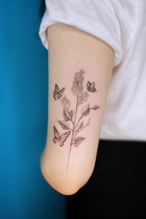 Beautiful Lilac Tattoos: Ideas, Designs, and Meanings Lilac Tattoos, Lilac Tattoo, Magnolia Tattoo, Lilac Blossom, Romantic Gestures, Wedding Tattoos, Minimalist Chic, Floral Tapestry, Tattoos Ideas