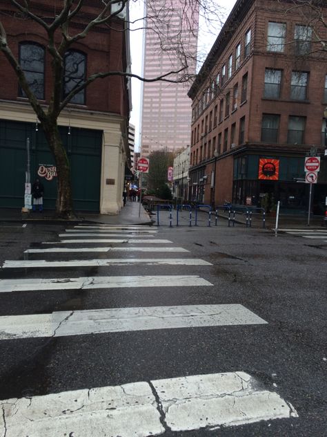 This photo describes the term alignment. While viewing this photo your eye is caught by the stripes of the crosswalk. Your eye follows them to the sidewalk. Showing  alignment that once you cross the crosswalk you get to the sidewalk downtown. The crosswalk is aligned with the sidewalk, showing that they belong together. That you have to cross the crosswalk before you can get to the other side on the side walk. Sidewalk Pictures, Anime Sidewalk Background, Street Sidewalk, City Crosswalk, City Sidewalk, Side Walk, Sidewalk Background, Crossing Street Photography, Cross Walk Photography