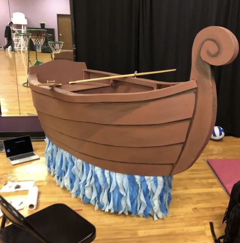 I like the water effect. Balled up cellophane for sparkle water effect? Cardboard Box Boats, The Little Mermaid Musical, Boat Props, Wizard Of Oz Decor, Cardboard Boat, Under The Sea Decorations, Dance Props, Stage Production, Little Mermaid Costume