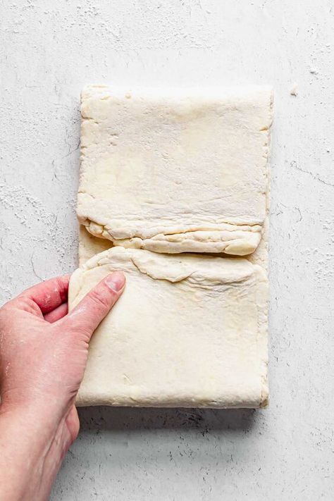 This quick flaky pastry recipe, also known as rough puff pastry, creates the crunchiest layers in this cheat version of puff pastry. Made by hand, this dough can be created in 1 hour and used in place of puff pastry in any recipe!Published 5/22/20; Republished 1/30/22 Rough puff pastry is a buttery, flaky, crunchy pastry once baked. This dough is made without yeast or eggs, and without food processor. The whole thing is made by hand! And bonus - the only ingredients are butter, flour… Rough Puff Pastry Recipes, Flaky Pastry Recipe, Rough Puff, Rough Puff Pastry, Tarts Crust, Pastry Recipe, Flaky Pastry, Puff Pastry Recipes, Pastry Brushes