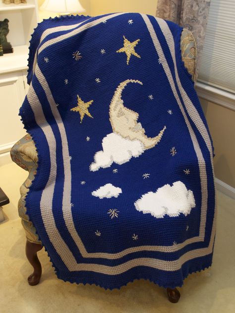 This is a picture blanket I made as a gift.   I  call it Celestial Sleep.  Stars, moon and clouds on this one of a kind crochet creation.  The base stitch is a tunisian stitch, also known as afghan stitch.  This afghan won a GRAND PRIZE in a district level Woman's Club competition and GRAND prize again in the State-wide competition at the Golden Nugget in Atlantic City in May, 2015.  Nice memory!  Designed and crocheted by Grace Cardiello. Free Crochet Baby Blanket Patterns, Crochet Baby Blanket Patterns, Free Crochet Baby Blanket, Baby Blanket Patterns, Afghan Stitch, Fast Crochet, Picture Blanket, Crochet Star, Golden Nugget