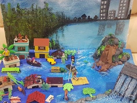 Flood Diorama, Tsunami Diorama, Natural Disasters Project, Natural Disasters Floods, Science Project Working Model, Natural Disasters Art, Flood In Pakistan, Science Exhibition Projects, Flood Mitigation