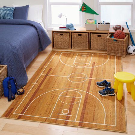 Mohawk's Basketball area rug is the height of contemporary decor for your child's bedroom. Fitting for a basketball fanatic, this is a detailed depiction of a basketball court in a pleasing tan shade. Made of EverStrand polyester, this rug is eco-friendly. Size: 3'4"x5'.  Color: Brown.  Pattern: printed. Basketball Room Decor, Basketball Bedroom, Sports Bedroom, Basketball Room, Sport Bedroom, Kids Area Rugs, Dekorasi Kamar Tidur, Sports Room, Big Boy Room