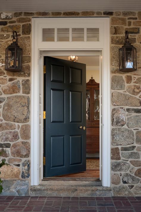 The simplicity of the brick terrace, the fieldstone and the custom lanterns make this new house front door look 100 years old! Front Door Styles, Farmhouse Front Door, Black Front Doors, Door Colors, Stone Farmhouse, Front Door Entrance, Bedroom Remodel, Transom Windows, House Front Door