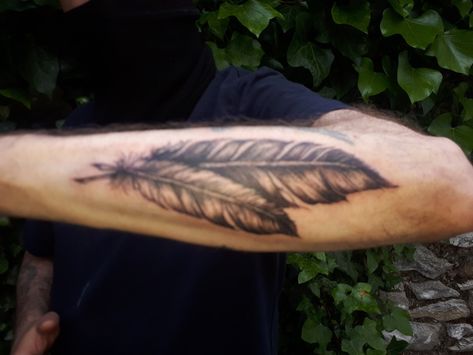 2 Feathers Tattoo Design, Mens Feather Tattoo Forearm, Men’s Feather Tattoo, Feather Tattoo Men Forearm, Red Tail Hawk Feather Tattoo, Country Tattoos For Men Forearm, Mens Feather Tattoo, Feather Tattoo Sleeve, Western Feather Tattoo