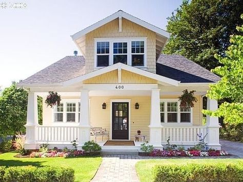 First impressions make a big impression…what does the outside of your home say to potential buyers? #ShorewestRealtors #SellingYourHome #PaintColor House With White Trim, Yellow House Exterior, Bungalow Homes, Yellow House, Exterior Paint Colors For House, Yellow Houses, Craftsman Style Homes, Craftsman Bungalows, Farmhouse Exterior