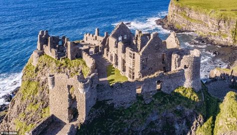 The iconic ruin of Dunluce Castle on the dramatic coastal cliffs of north County Antrim in Ireland bears witness to a tumultuous history Antrim Ireland, Dunluce Castle, Killer Bunny, Story Settings, Castle Illustration, Castle Ireland, British Castles, Ancient Castle, Hp Aesthetic