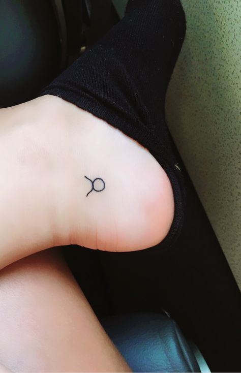 Small Taurus ankle tattoo Taurus Ankle Tattoo, Small Taurus Tattoo, Feminine Taurus Tattoo, Tattoos Alt, Tattoo Taurus, Taurus Things, Hand Tattoo Images, Small Geometric Tattoo, Minimalistic Tattoos