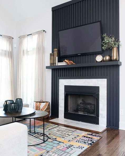 These Sophisticated Black Accent Walls Will Make an Impact in Any Space Contemporary Gray Living Room, Wood Panel Walls Fireplace, Black And Wood Fireplace Wall, Black Slat Wall Fireplace, All Black Fireplace Wall, Iron Ore Fireplace Wall, Updating Fireplace, Black Modern Fireplace, Modern Black Fireplace