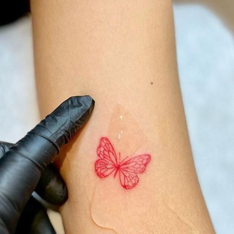 R’ink Tattooz - Tattoo studio, Delhi on Instagram: "Isn’t red inked cool 😉 fine line work by @ng.ringvean 
Butterfly x heart tattoo
.
For tattoo appointment / queries 
📩 @rinktattooz 
☎️ +91 96670 20423
📍 E-13, 2nd floor, South extension II main main market, New Delhi 
.
.
.
.
#redinktattoo #redtattoo #smalltattoo #tinytattoo #finelinetattoo #neatlinetattoo #qualitytattoo #highqualitytattoo #cleanlinetattoo #butterflytattoo #hearttattoo #tattooforgirls #tattooideas #tattoodesign #tattooart #art #design #easthetic #easthetictattoo #tattooartist #tattoo #artist #delhitattoostudio #delhitattooartist #tattoostudio #tattooshop #inked" Tattoo Appointment, Red Ink Tattoos, Red Tattoos, Line Work, Fine Line Tattoos, Red Ink, Line Tattoos, Fine Line, Heart Tattoo