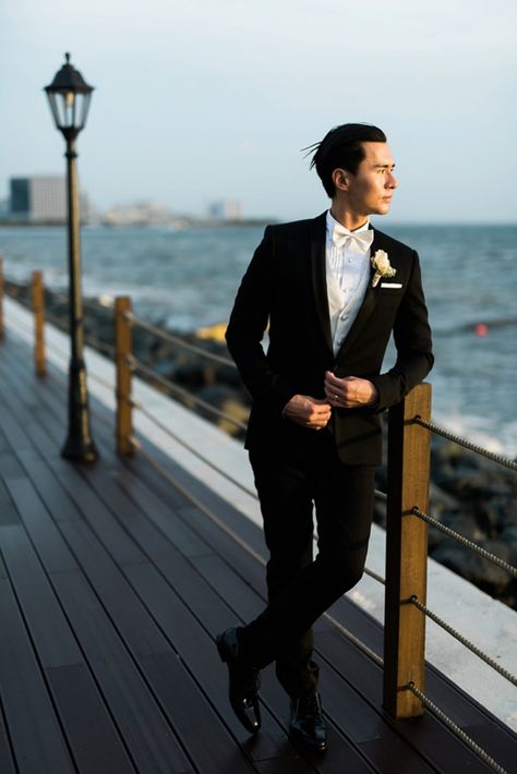 Classic black tuxedo with a white bow tie for the groom - love it! | Romantic Blush Wedding via @bridenbreakfast White Bow Tie Tuxedo, Groom Black Tuxedo White Bowtie, Black Tuxedo White Bow Tie, Tux With White Bow Tie, Black Suit White Bow Tie, Black Tie Groom And Groomsmen, White Bow Tie Groom, Black Suit With Bow Tie, Groom Suit Bow Tie