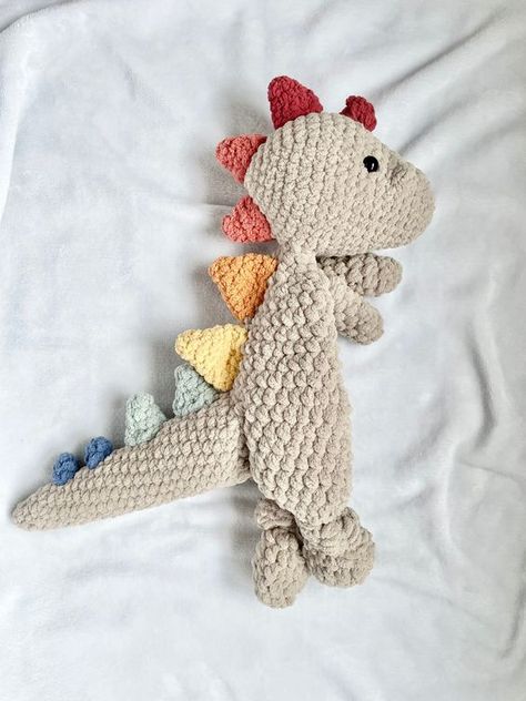 MADE TO ORDER - Crochet Bohosaurus/Dinosaur Snuggler Crochet toys ideas #crochettoysideas #crochet #crochettoy #crochetpattern #crochetpatterns 2.689 Crochet Dinosaur Snuggler Pattern Free, Dinosaur Snuggler Crochet Pattern, Big Crochet Animals, Crochet Baby Stuffed Animals, Chunky Yarn Ideas, Plush Yarn Crochet Patterns, Crochet Dinosaur Blanket, Crochet Snuggler Free Patterns, Crochet Dinosaur Snuggler