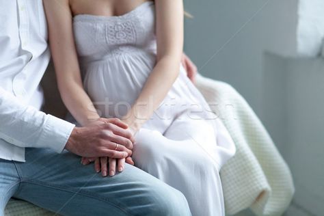 The young couple  dressed in white standing at home stock photo (c) master1305 (#6489954) | Stockfresh Men And Babies, Ivf Clinic, Chances Of Getting Pregnant, Ivf Center, Fertility Center, Human Dignity, Couple Dress, Pregnancy Test, Reproductive Health