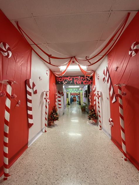 Candyland themed School Hall Christmas Decorating Ideas, Winter Candyland Theme, Christmas Hallway Themes For School, Candy Cane Hallway Decorations, Christmas Decorations School Hallways, Christmas Extravaganza Ideas, Classroom Hallway Christmas Decorations, Hallway Christmas Decorating Ideas Work, Candy Christmas Office Decor