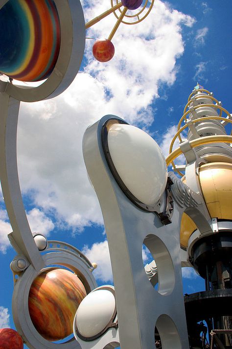 The Astro Orbiter is a rocket-spinner attraction featured at all five Magic Kingdom-style parks at Walt Disney Resorts around the world. Although each ride may have a different name, all share the same premise of rockets spinning around a central monument. As each form of the attraction appeared, new designs and locations have been implemented to fit with changing schemes of several Tomorrowlands. https://en.wikipedia.org/wiki/Astro_Orbiter Funny One Liners, Alien Encounters, Disney Magic Kingdom, Disney Resorts, Disney Park, B Movie, Disney Resort, Monsters Inc, Dieselpunk