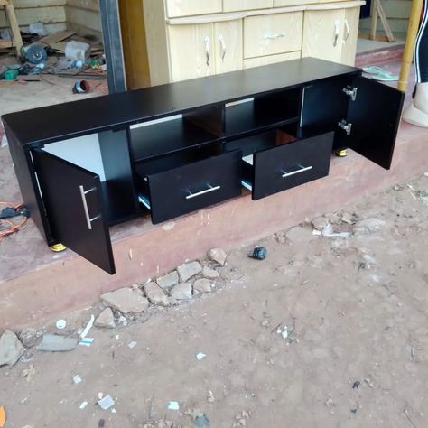 Looking for classic and durable TV stands to design your living room with Elegance, check out the different designs from Deks furniture today +256 702 113205 #deksfurniture #deksenterprises #furnituredesign #furniture #bestfurniture #classicfurniture #durablefurniture #sidebords #wardrobes #samueluganda #janeuganda #winton256 Furniture For Tv, Wooden Wardrobe Design, Tv Unit Furniture Design, Tv Stand Furniture, Tv Unit Furniture, Wooden Wardrobe, Durable Furniture, Wardrobe Design, Tv Stands