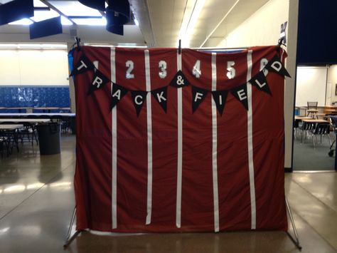 Track and field banquet photo backdrop. Instead of a super expensive photo booth, I made my own backdrop to take fun photos in front of. This is burnt red fabric with white duct tape and iron on numbers. Banquet Photo Backdrop, Banquet Outfit Ideas, Track Banquet, Track And Field Games, Church Youth Activities, Banquet Outfit, Banquet Centerpieces, Team Dinner, Sports Banquet