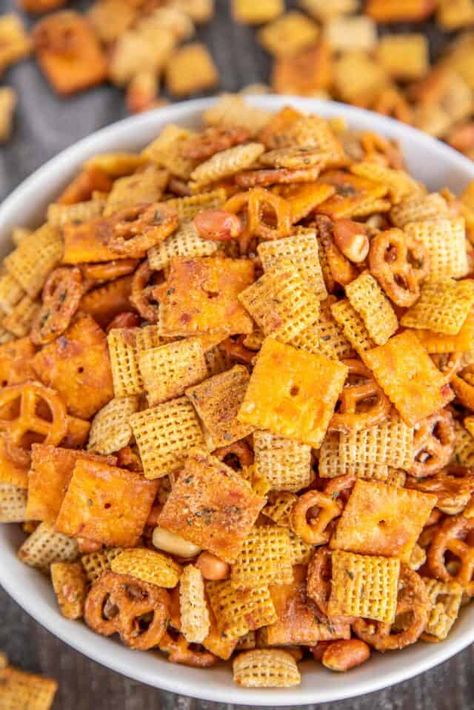 Cheesy Ranch Chex Mix -we are obsessed with this yummy snack mix! Super easy to make and even easier to eat! Cheez-Its, Chex cereal, peanuts, pretzels, butter, Worcestershire, and Ranch seasoning. Can make ahead of time and store in an airtight container. Great for parties, holiday snacking, tailgating, and homemade gifts. I make this for parties and never have any leftovers. Whip up a batch today! Original Chex Mix Oven Recipe, Cheese Chex Mix, Cheesy Chex Mix, Cheesy Ranch Chex Mix, Ranch Chex Mix Recipes, Savory Chex, Savory Chex Mix, Spicy Chex Mix, Chex Party Mix Recipe