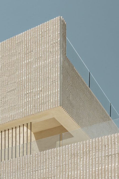 Travertine Steps, Fluted Concrete, Curved Patio, Sunken Patio, Menorca Spain, Facade Material, Building Aesthetic, Concrete Facade, Concrete Walls